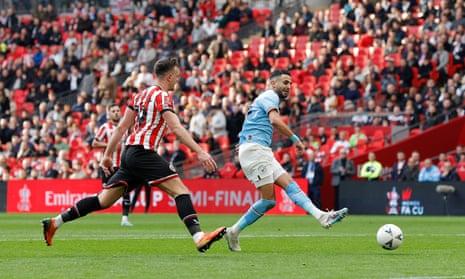 Riyad Mahrez scores his, and Manchester City’s, second goal of the game during the Emirates FA Cup Semi Final match between Manchester City and Sheffield United at Wembley Stadium.