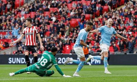 Riyad Mahrez celebrates after sccoring his, and Manchester City’s, second goal of the game during the Emirates FA Cup Semi Final match between Manchester City and Sheffield United at Wembley Stadium.