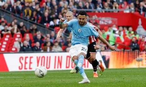 Riyad Mahrez of Manchester City scores the opening goal from the penalty spot during the Emirates FA Cup Semi Final match between Manchester City and Sheffield United at Wembley Stadium.