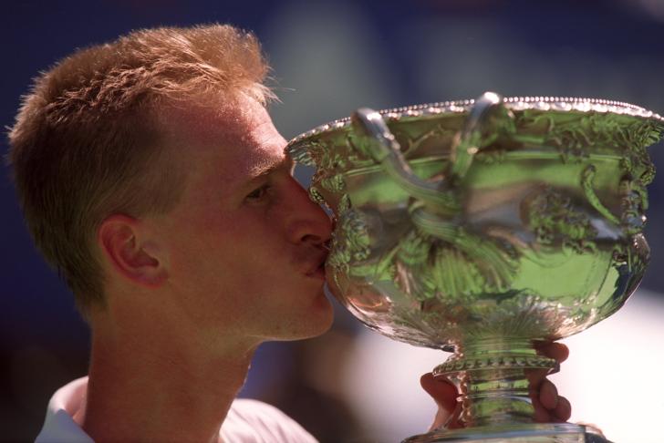 Petr Korda kisses the Australian Open trophy after winning in 1998.