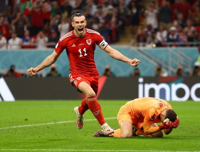 Wales’ Gareth Bale celebrates scoring their equaliser v USA