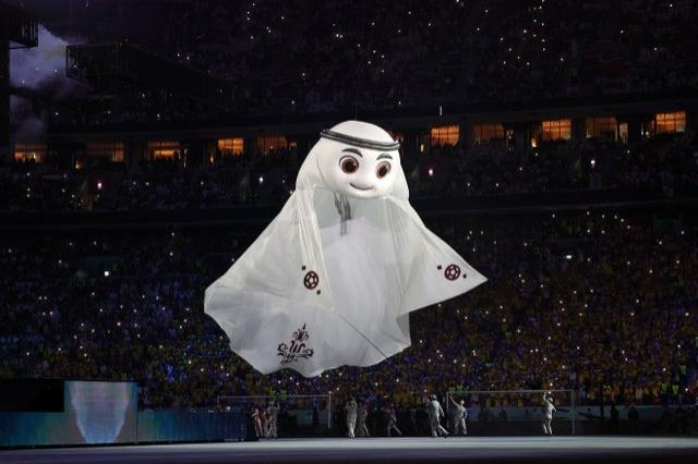 The Qatar 2022 mascot La’eeb performs during the opening ceremony