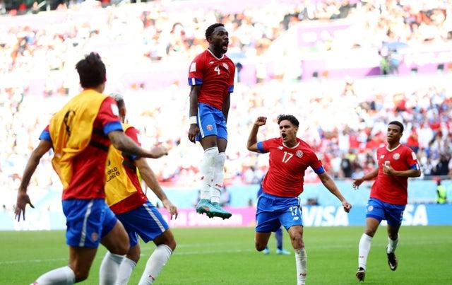 Costa Rica’s Keysher Fuller celebrates scoring their first goal with Yeltsin Tejeda and teammates v Japan